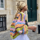 Emily – Pull Ouvert à Manches Bouffantes